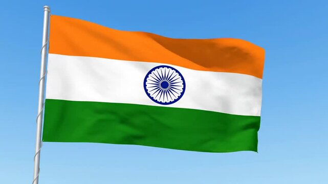 Waving national flag of India against clear blue sky
