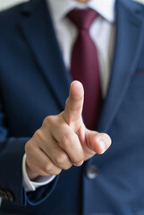 Businessman Pointing Finger Forward - Direct Interaction or Selection Gesture