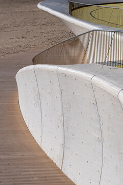 Curve concrete wall and wood walkway with modern architecture lines in minimalism creating space for text in contemporary public design