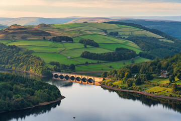 Naklejka premium Ashopton Viaduct aerial sunset view at Ladybower Reservoir in Peak District. England 