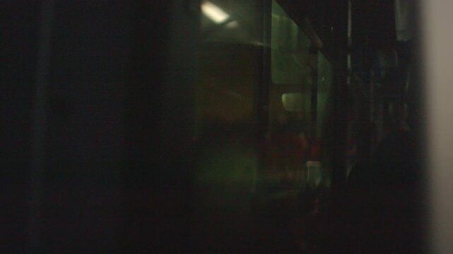 Quiet nocturnal journey, Peaceful evening bus trip experience, Calm night voyage with soothing engine sounds, Serene late night expedition aboard softly illuminated bus with peaceful ambiance 