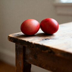 Traditional Orthodox Easter red eggs on rustic wooden table