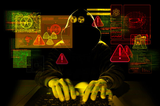 Hooded cyber threat targeting nuclear energy infrastructure. Digital interface with radiation symbols, warning alerts and industrial control system data, concept of critical infrastructure attack.