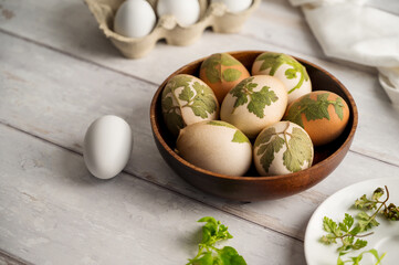 DIY Easter eggs with natural leaves, creating patterns on eggs using plants. Eco friendly colouring easter eggs