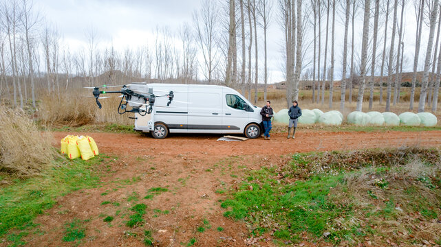 Agricultural drone preparing for crop spraying
