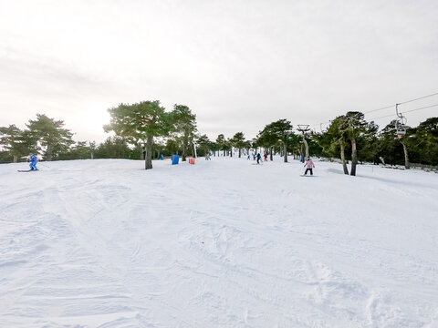 Skiing at Puerto de Navacerrada in Madrid's snowy landscape