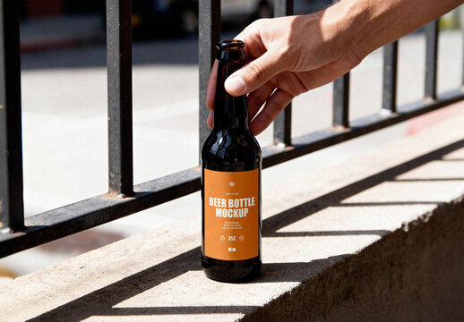 Opened Beer Bottle in Hand Mockup