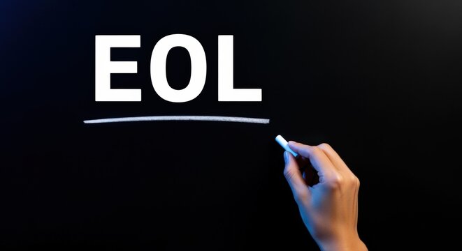 EOL Acronym on Chalkboard with Hand Holding Chalk, Concept of Product Lifecycle Management
