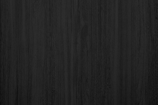 Dark wood texture, used as a background or surface material.