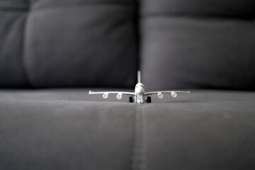 toy airplane model on the sofa