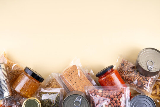 Emergency food kit. Non-perishable instant food, homemade Survival food set with in case of natural disasters, war, power outages, hazards, including canned goods, cereals, pasta, legumes, nuts, seeds
