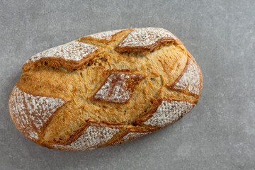 rustic sourdough bread on gray background