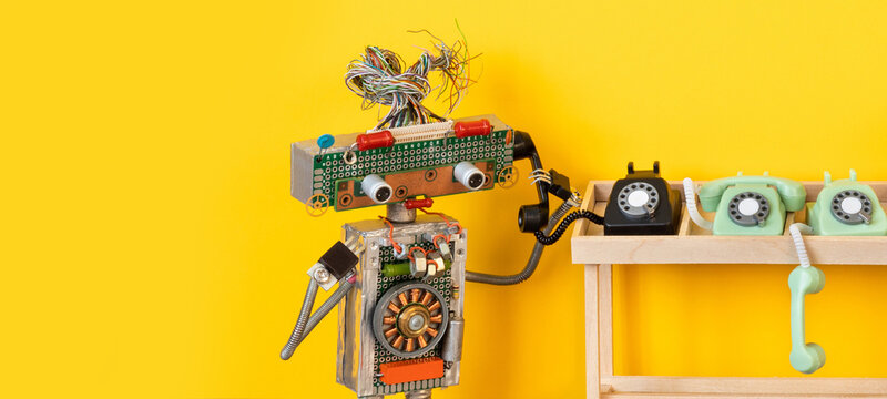 Robot operator holding rotary phone receiver to ear, wooden desk with other phones nearby. Call center concept, telecommunication poster, service hotline banner