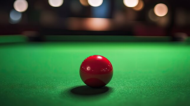 Bright Red Pool Ball on Green Felt Surface with Blurred Background Bokeh Lighting for Snooker and Billiards Conceptual Imagery in Sports and Games