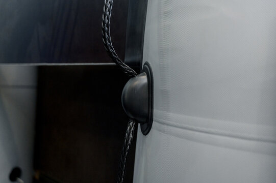 Inflatable PVC boat with a hard floor and oar holders