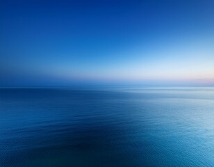 Obraz premium minimalist seascape with smooth blue gradient sky at dusk