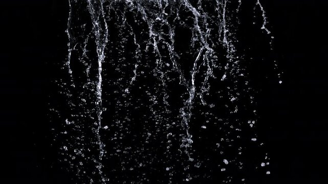 Super Slow Motion Shot of Falling Water Isolated on Black at 1000fps.
