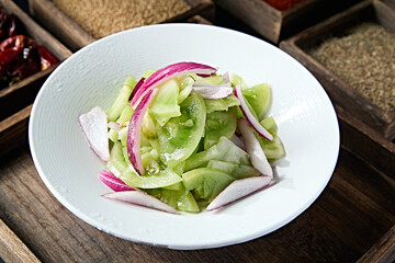 Onion slices mixed with light persimmon