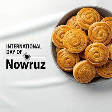 A grey bowl of golden Shor Gogal pastries on a white background celebrating the International Day of Nowruz festival.