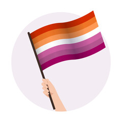 Fototapeta premium Lesbian waving pride flag in raised hand. Support vector illustration