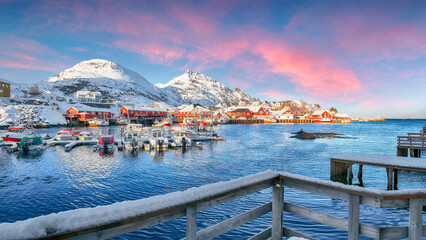 Captivating snowy  cityscape of Sorvagen town and port. © pilat666