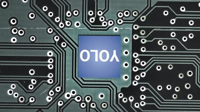 You Only Look Once processor rotating on a circuit board, representing the concepts of AI, deep learning, computer vision, real time object detection, and advanced technological innovation