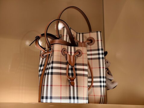 Paris,France-Oct.5th 2025: close-up Burberry drawstring bucket bags featuring the classic beige check pattern
