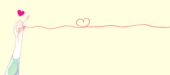 運命の赤い糸を結んでいる女性の手