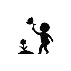 Child holding teddy bear silhouette beside flower