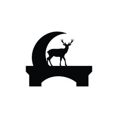 Deer standing on bridge under crescent moon silhouette