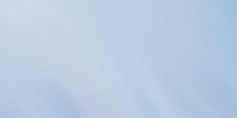 Obraz premium Light blue textured background with fine grain and soft hues