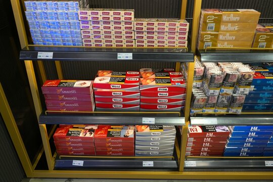 VALENCIA, SPAIN - JANUARY 6, 2026: Cigarette cartons wholesale in a duty free shop of Valencia Airport, Spain.