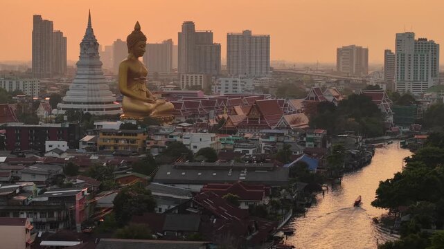 Big golden buddha statue riverside temple pagoda local village city background Bangkok Thailand