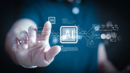Obraz premium Businessman hand touching virtual AI icon interface. Concept of artificial intelligence technology, machine learning, big data analysis, cyber security and future global innovation.