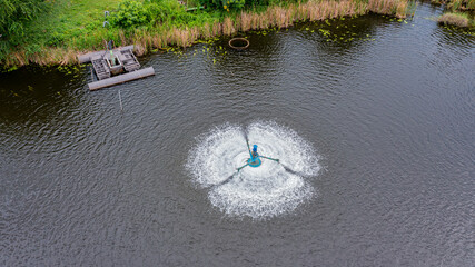 Water treatment turbines in water sources.