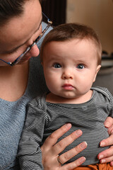 Mother talking to her young child, close-up.