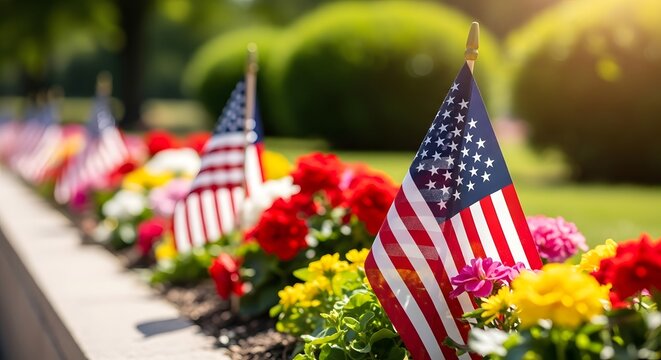 American flags and vibrant flowers on a memorial or patriotic display