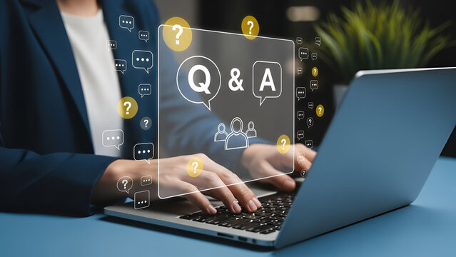 Person Typing on Laptop with Q and A question marks