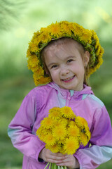 Girl with a crown of dandelions
