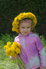 Girl with a crown of dandelions