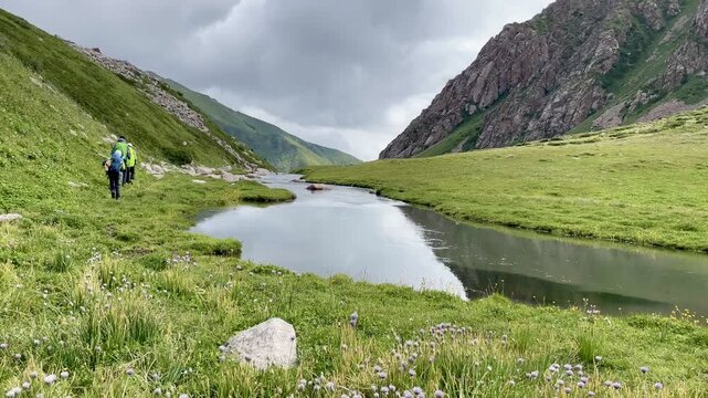 Group of hikers undertaking the multi-day Ak-Su Traverse in the spectacular Terim Tor Valley, Kyrgyzstan.