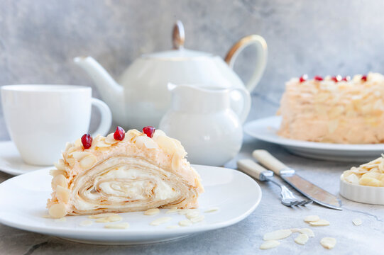 Trendy Shrovetide roll of thin pancakes with cream