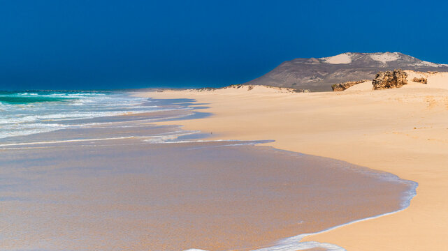 Remote sandy beach with ocean waves, Varadinha beach, Boa Vista, Cape Verde