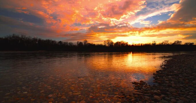 Spectacular red sunset on the river.
