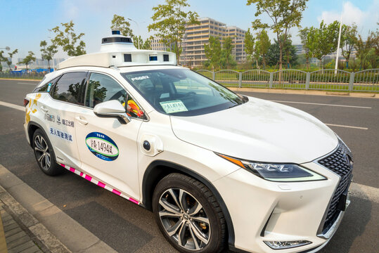 Shanghai, China 1 Nov 2025. Level 4 Robotaxi with lidars, multi camera array, radar sensors and end to end AI driving stack. Transports real passengers as China leads next gen mobility technologies.