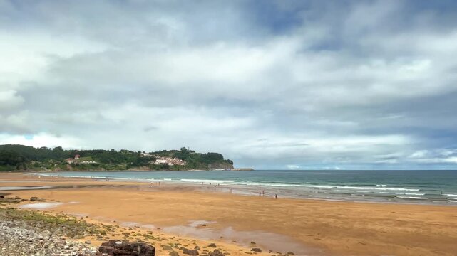 View from La Griega beach of the beautiful tourist town of Lastres, Principality of Asturias, Spain.