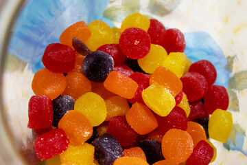 A bunch of colorful gummy candies photographed up close