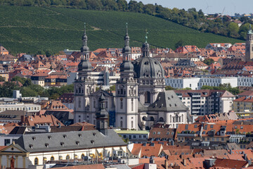 Obraz premium Panoramic view from Festung Marienberg overlooking Würzburg’s historic old town, the Main River and the iconic Old Main Bridge lined with monumental statues.
