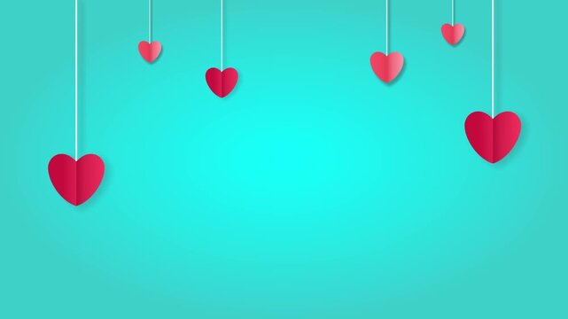 Hanging hearts on a green background
