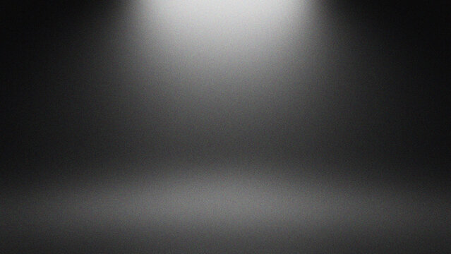 Spotlight illuminating empty studio background dark moody atmosphere copy space